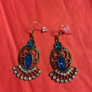 Earrings Gold Tone New never worn. Stunning color